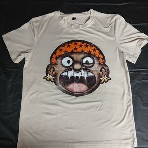 Cream Tee with Bold Cartoon Face and Orange Star Band